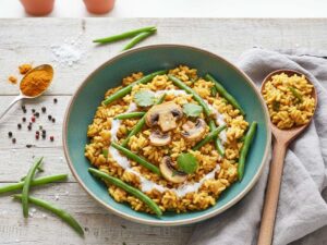 Curry-Risotto mit Bohnen und Champignons
